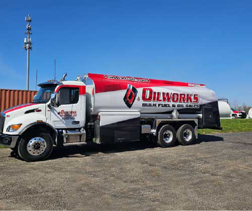 A fleet fueling truck in a parking lot
